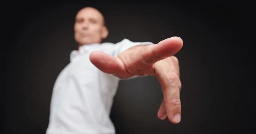 Emerging leader developing skills through coaching conversation and deliberate practice with mentor